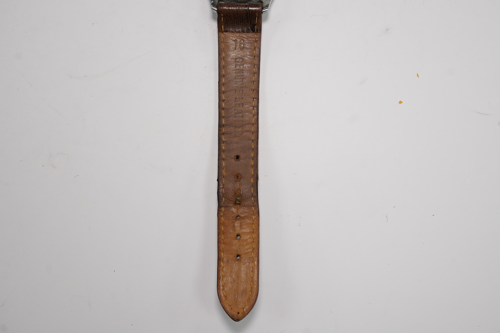 A gentleman's steel Russian manual wind wrist watch, the dial inscribed Kupoba, with Arabic dial, case diameter 34mm. Condition - poor